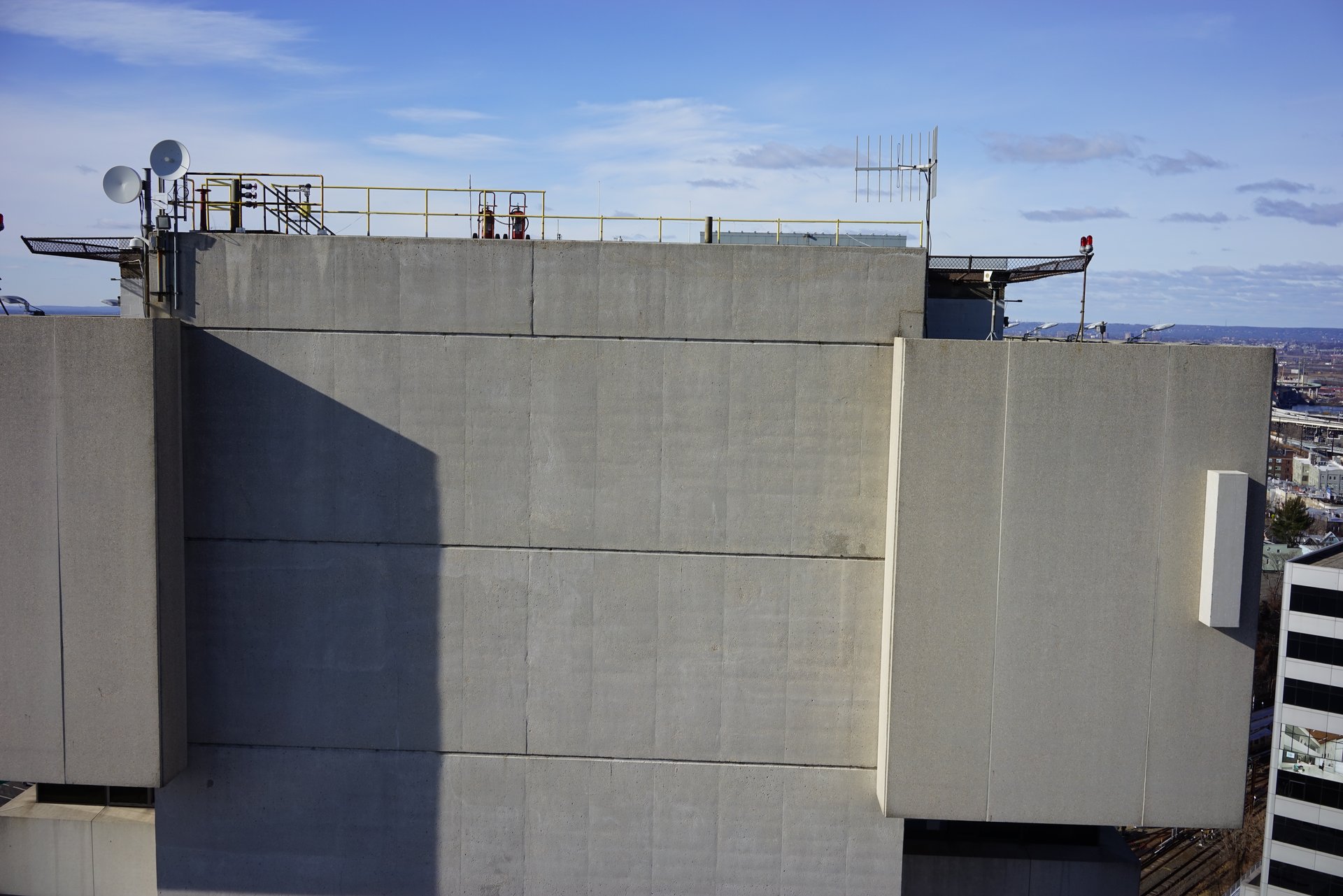 Close-up drone view of facade masonry detail on Journal Square Tower